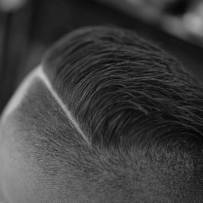 Men's hair styling by Blade and Badger in Philadelphia with a cut in part