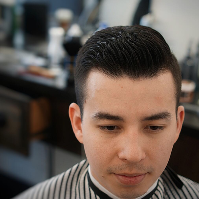 Smooth hair styling for all hair types at barber shop in Philly